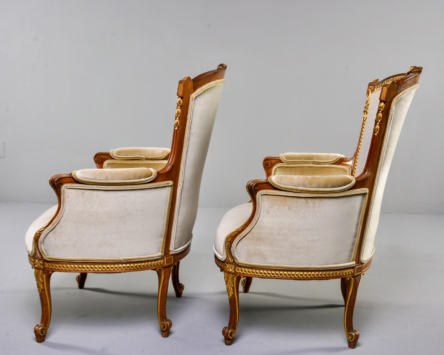 Carved Pair of Early 20th Century Louis XV French Walnut and Gilt Chairs