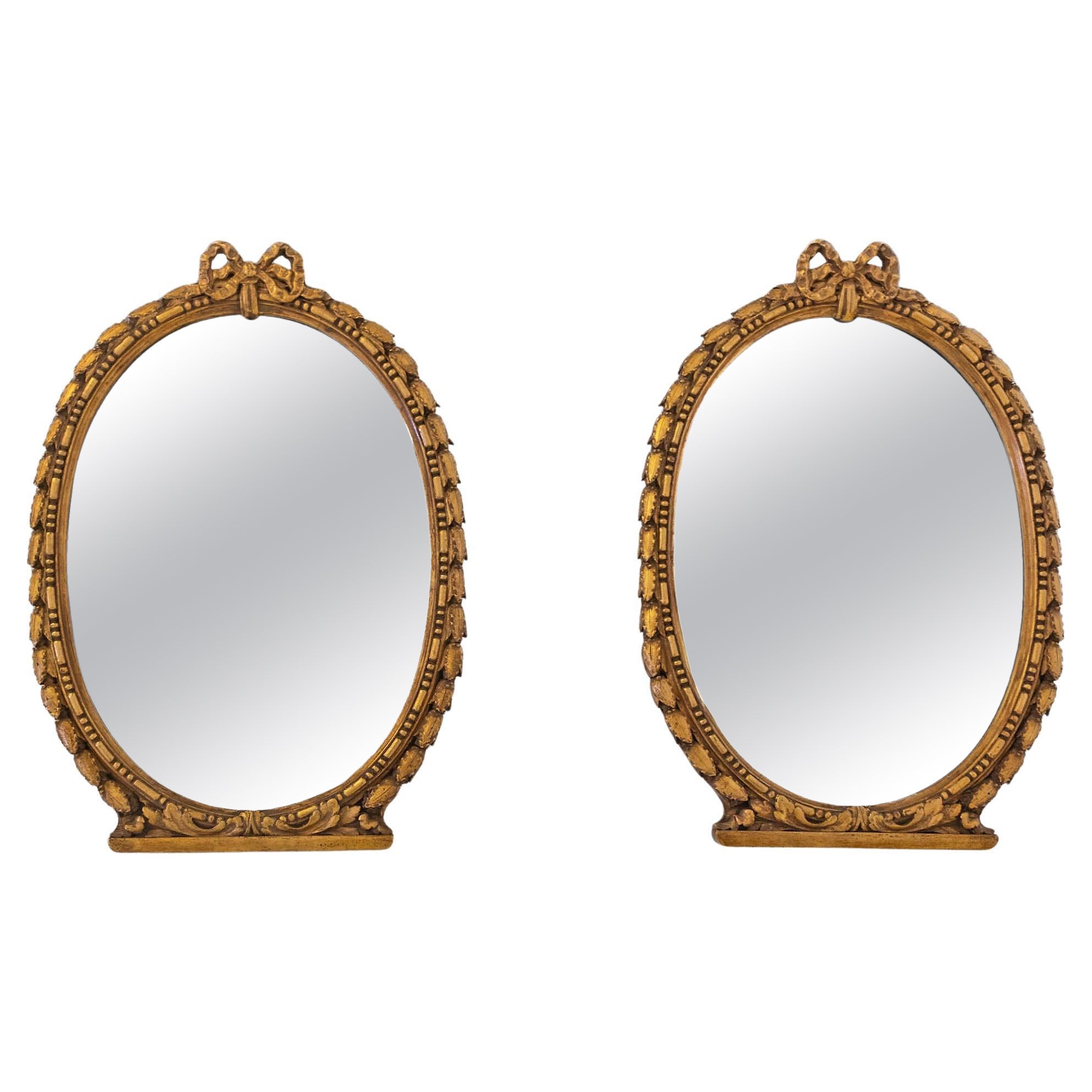 Pair Early 20th Century Small Oval Gilt Composition Wall Mirrors