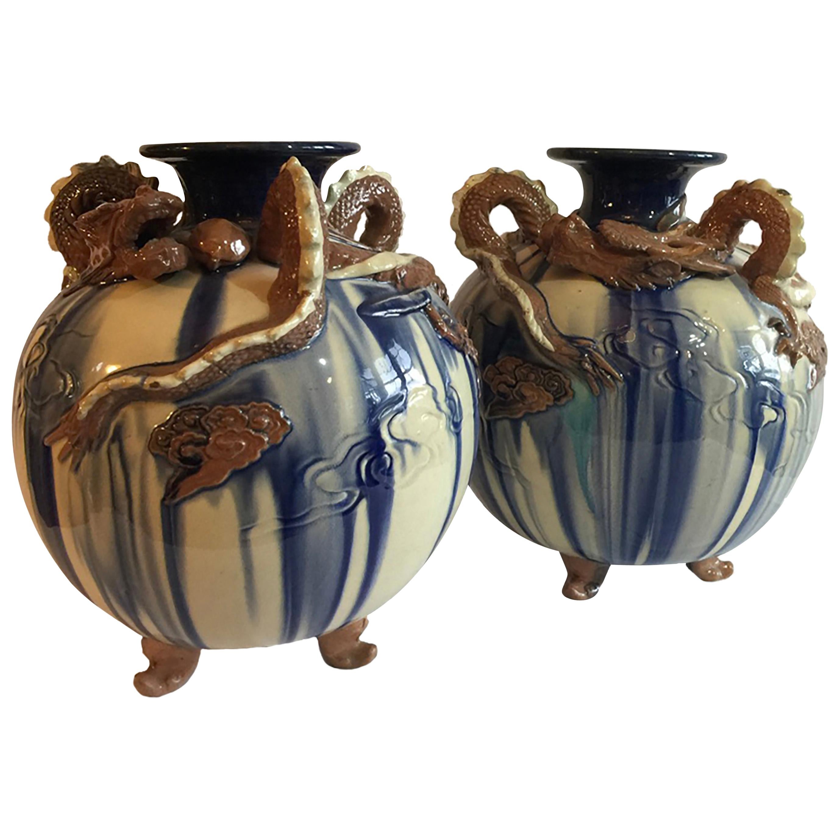 Pair of Early 20th Century Oriental Inspired Blue & White Art Pottery Vases For Sale
