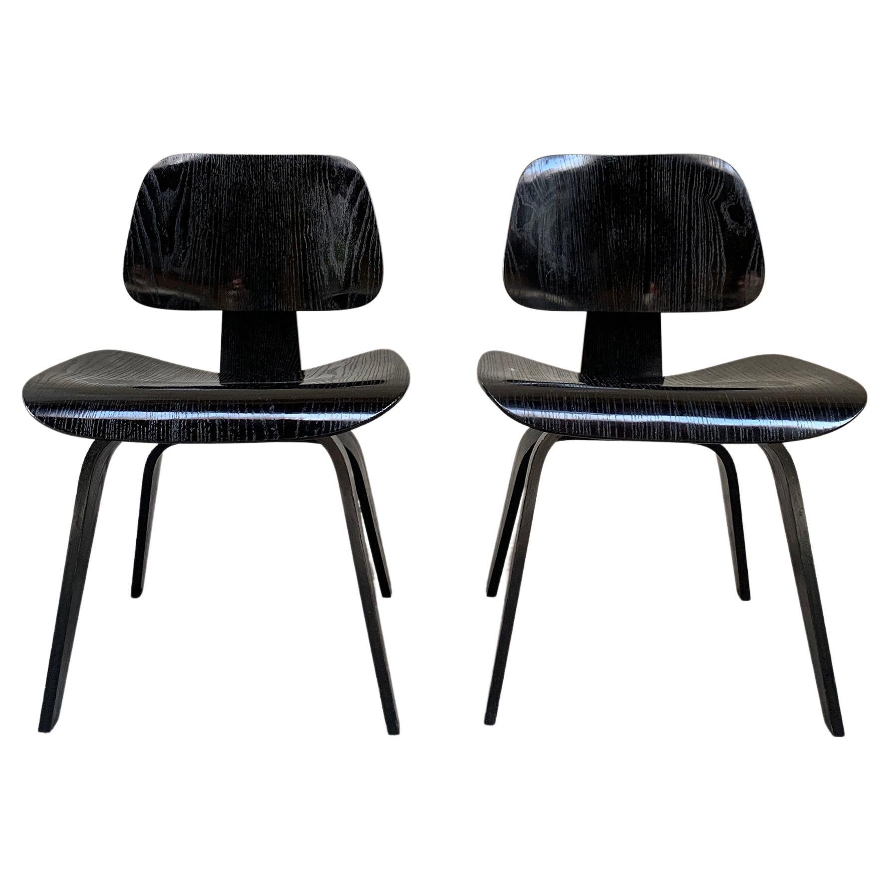 Pair early DCW Dining Chair in black by Charles & Ray Eames, Herman Miller 1950s