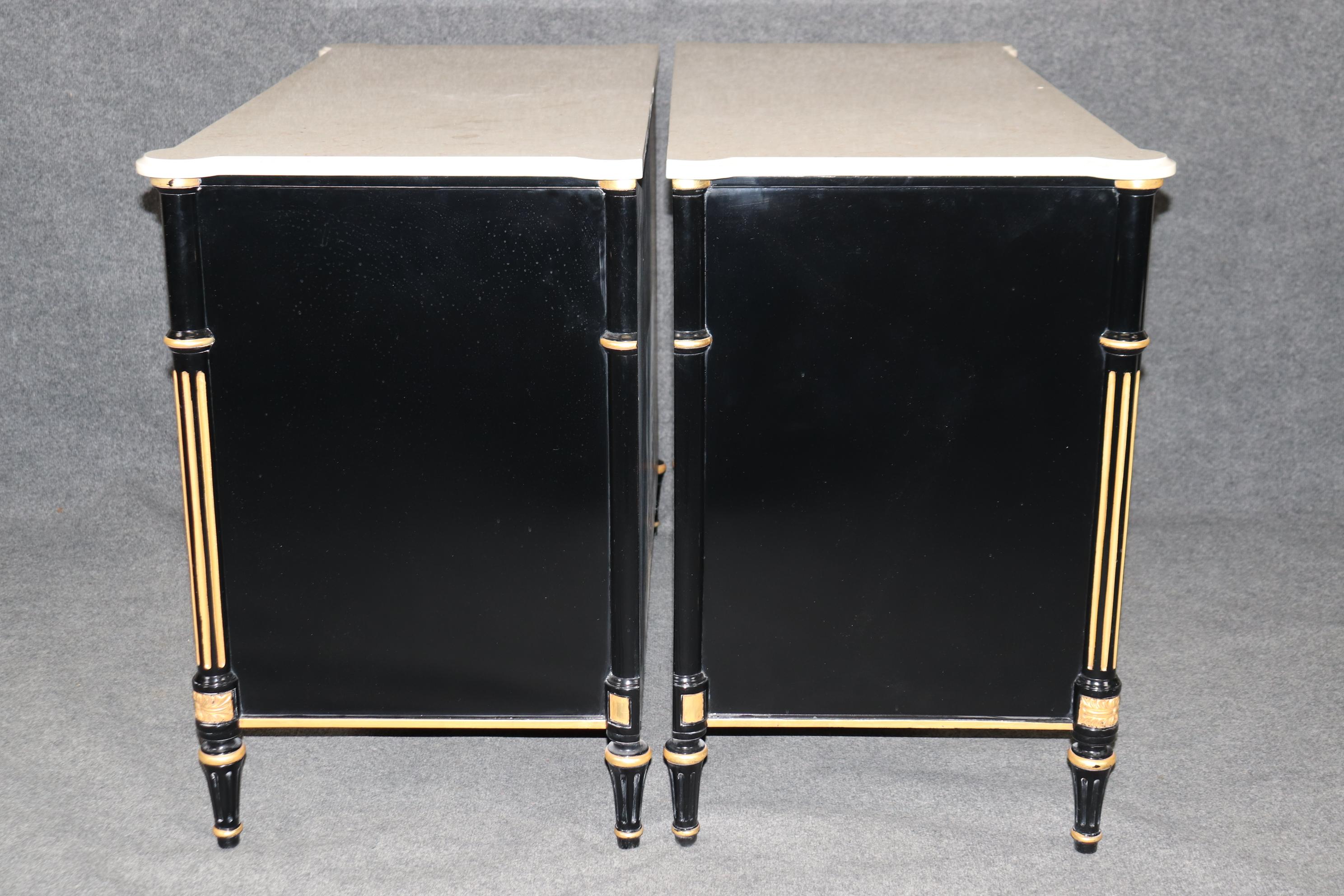 Pair Ebonized Directoire Style Maison Jansen Style Marble Top Gilded Commodes In Good Condition In Swedesboro, NJ