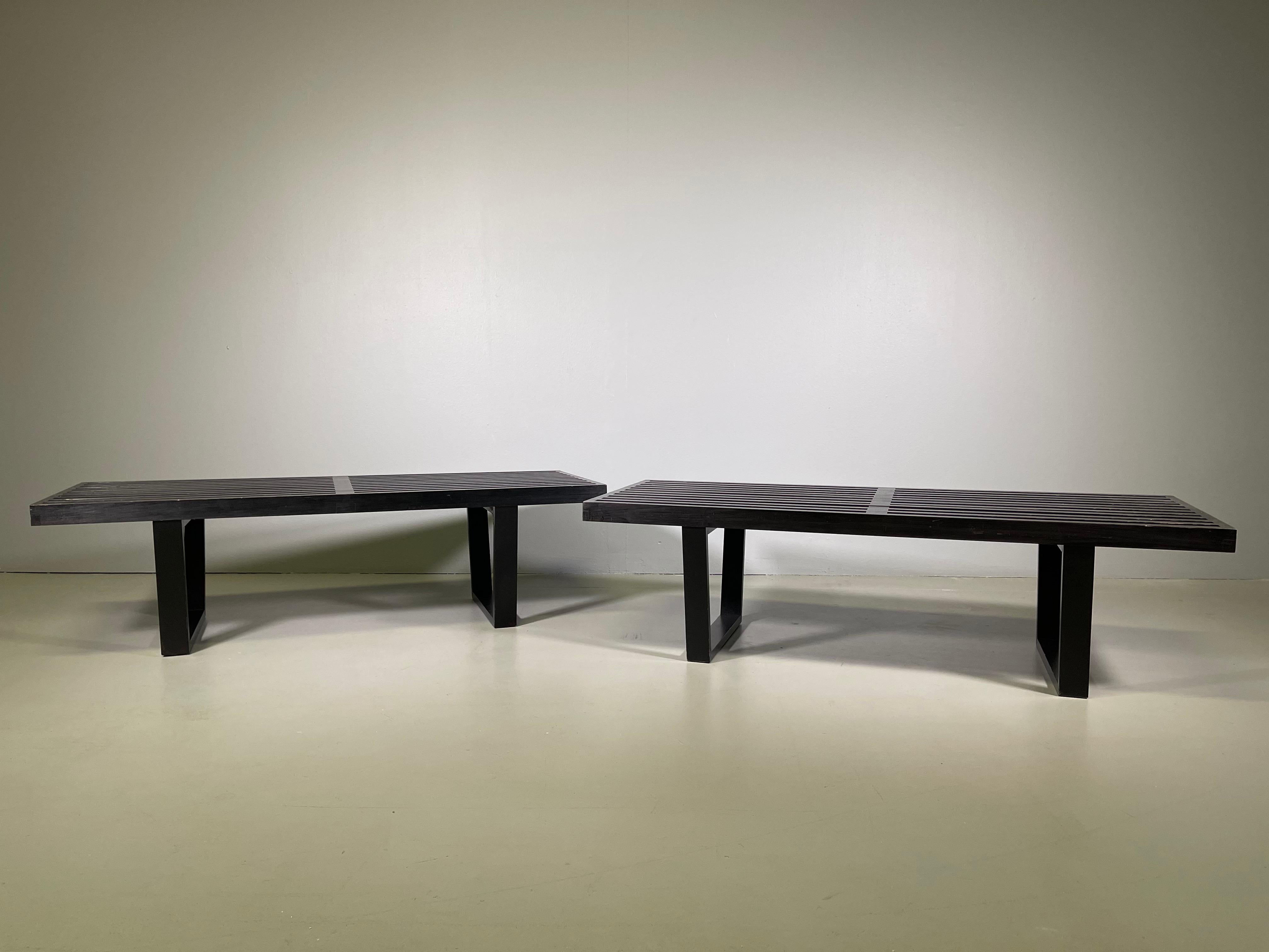 Pair of this iconic slat bench by George Nelson for Herman Miller can serve as either seating or as a coffee table.