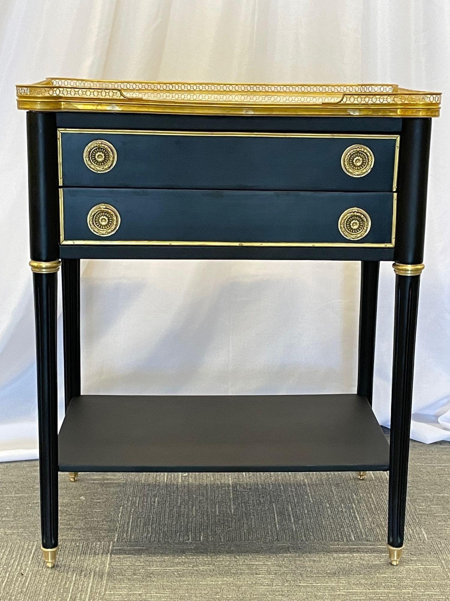 Pair of Ebony Finished Hollywood Regency or neoclassical side, lamp tables, nightstands / end tables, Manner Jansen
 
Pair of Swedish neoclassical nightstands or end tables with two drawers in the manner of Maison Jansen. These finely crafted end