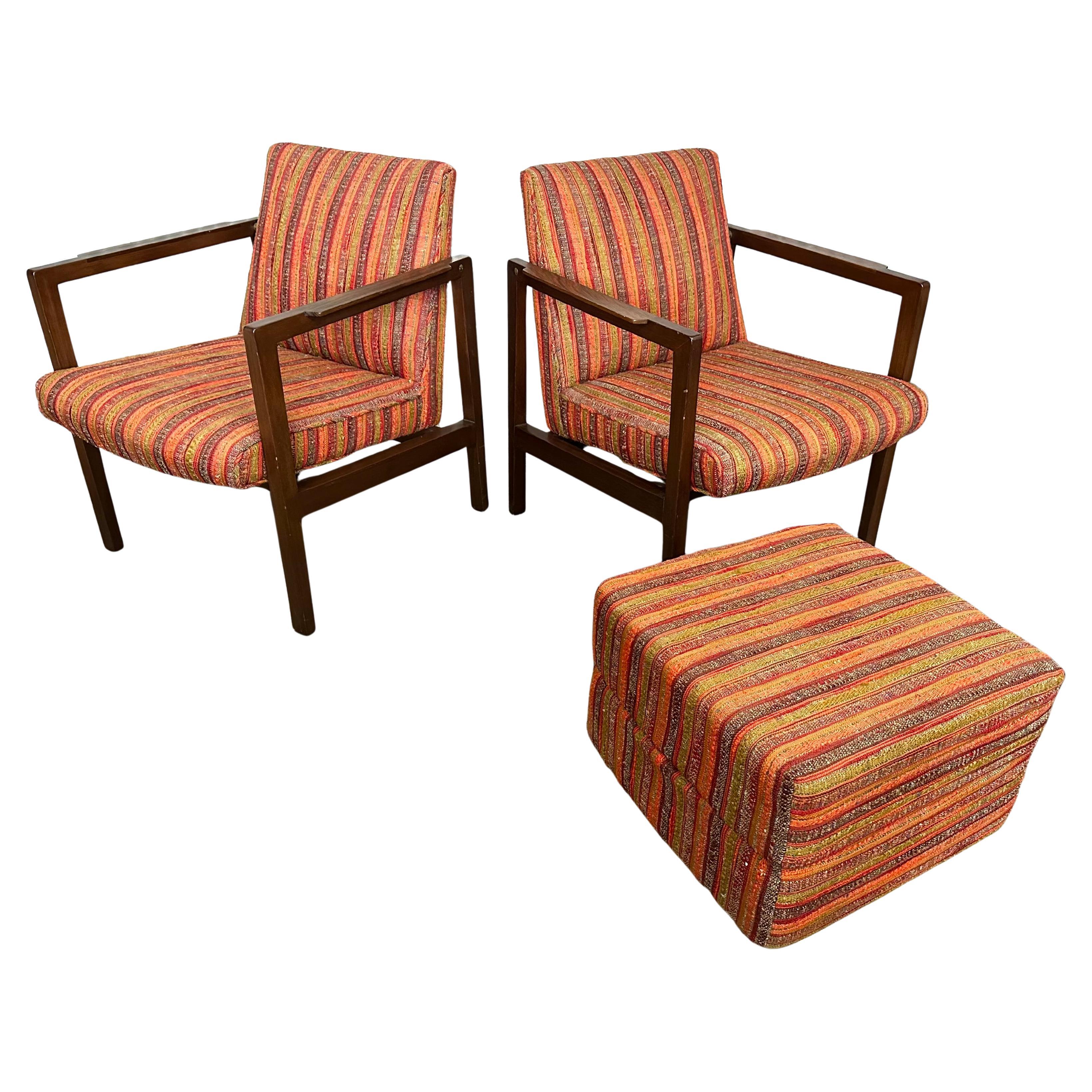 Dark Mahogany frames with brass arm joints and rosewood armrests, in original Jack Lenor Larsen fabric. Custom upholstered unstructured cube was made to function as an ottoman or stool.