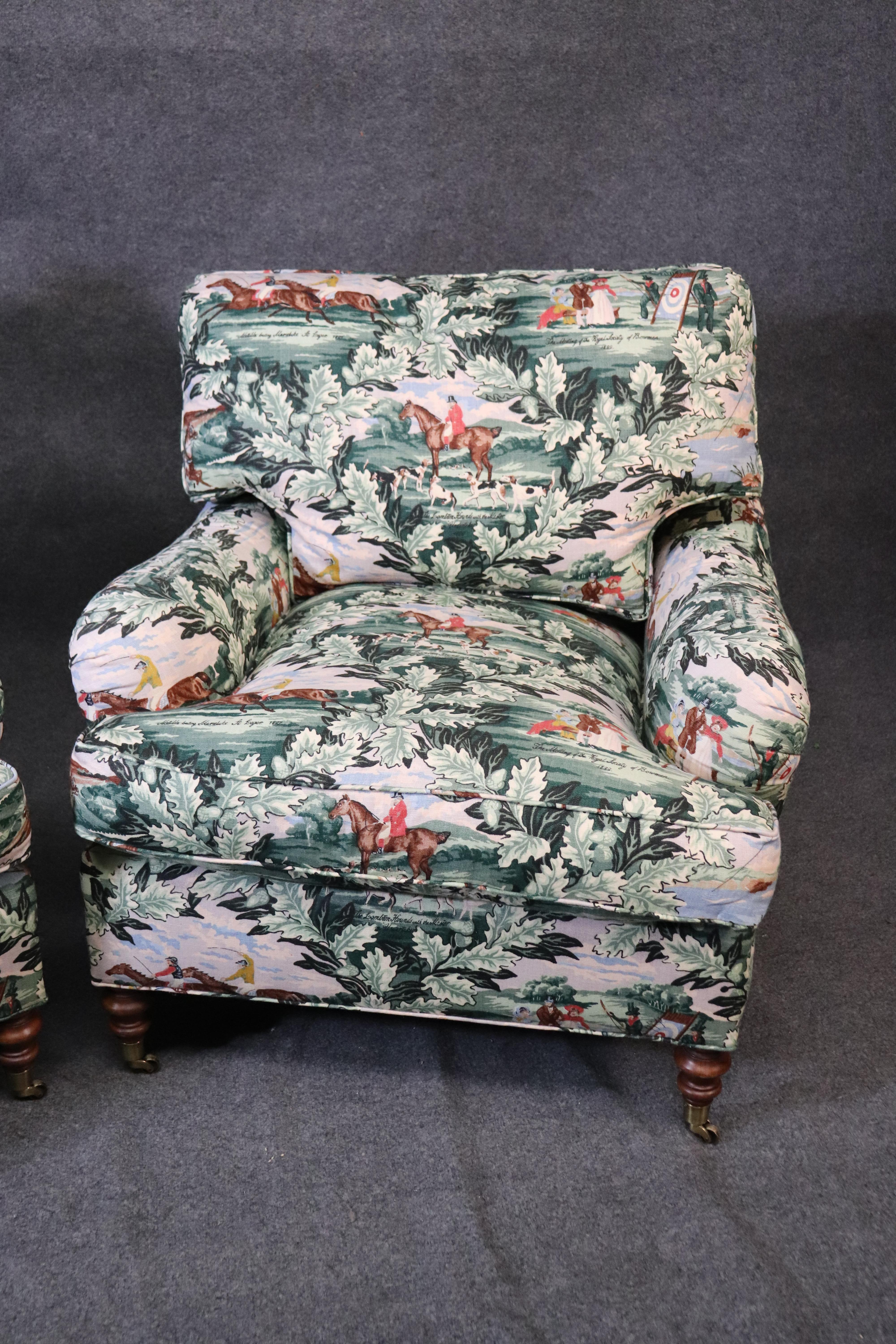 This is a beautiful pair of Edward Ferrell club chairs with antique polo playing motifs. The chairs are in very good original condition. They measure 32 tall x 35 wide x 43 deep and the seat height is 20 inches.