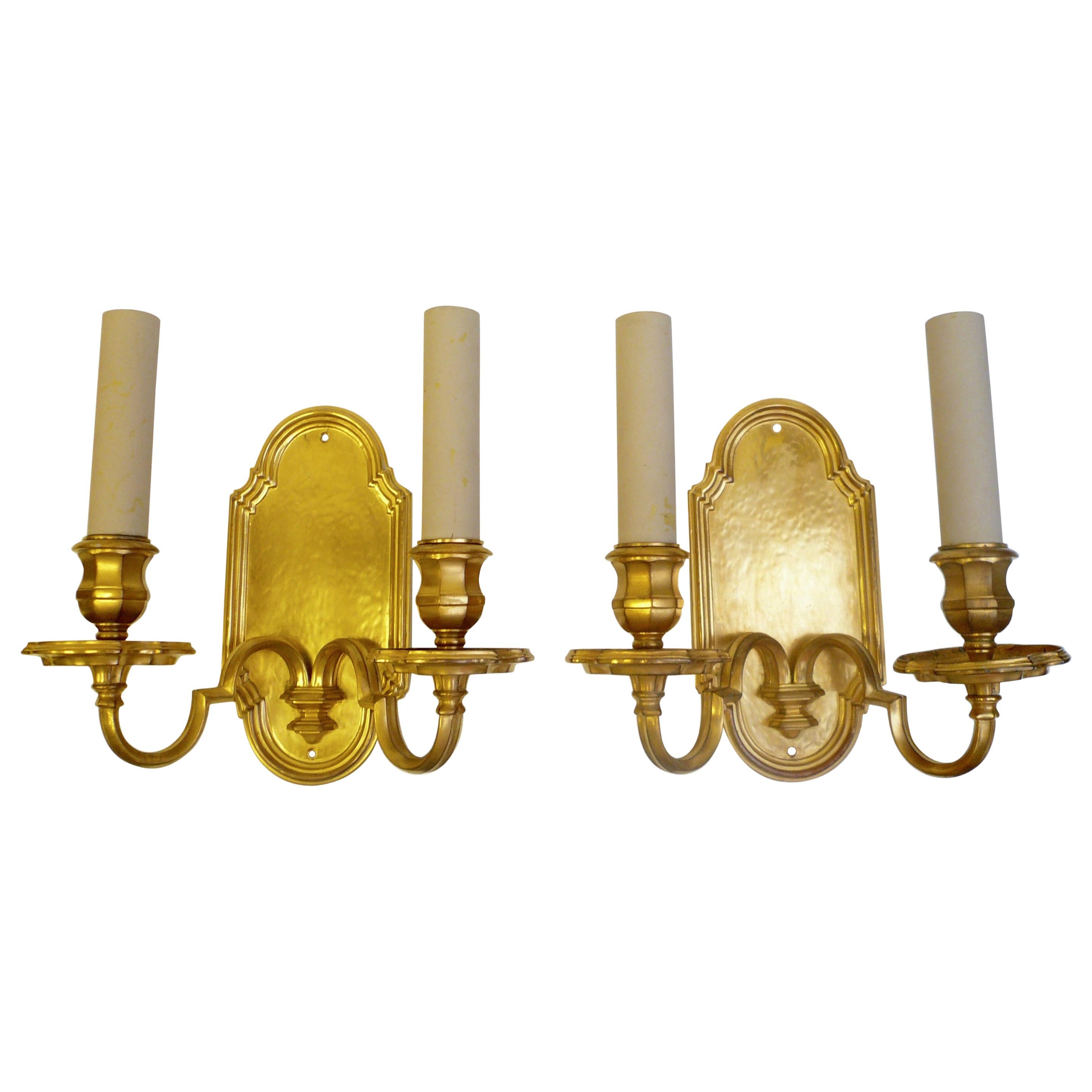 Pair of E.F. Caldwell Gilt Bronze Early Georgian Style Sconces For Sale