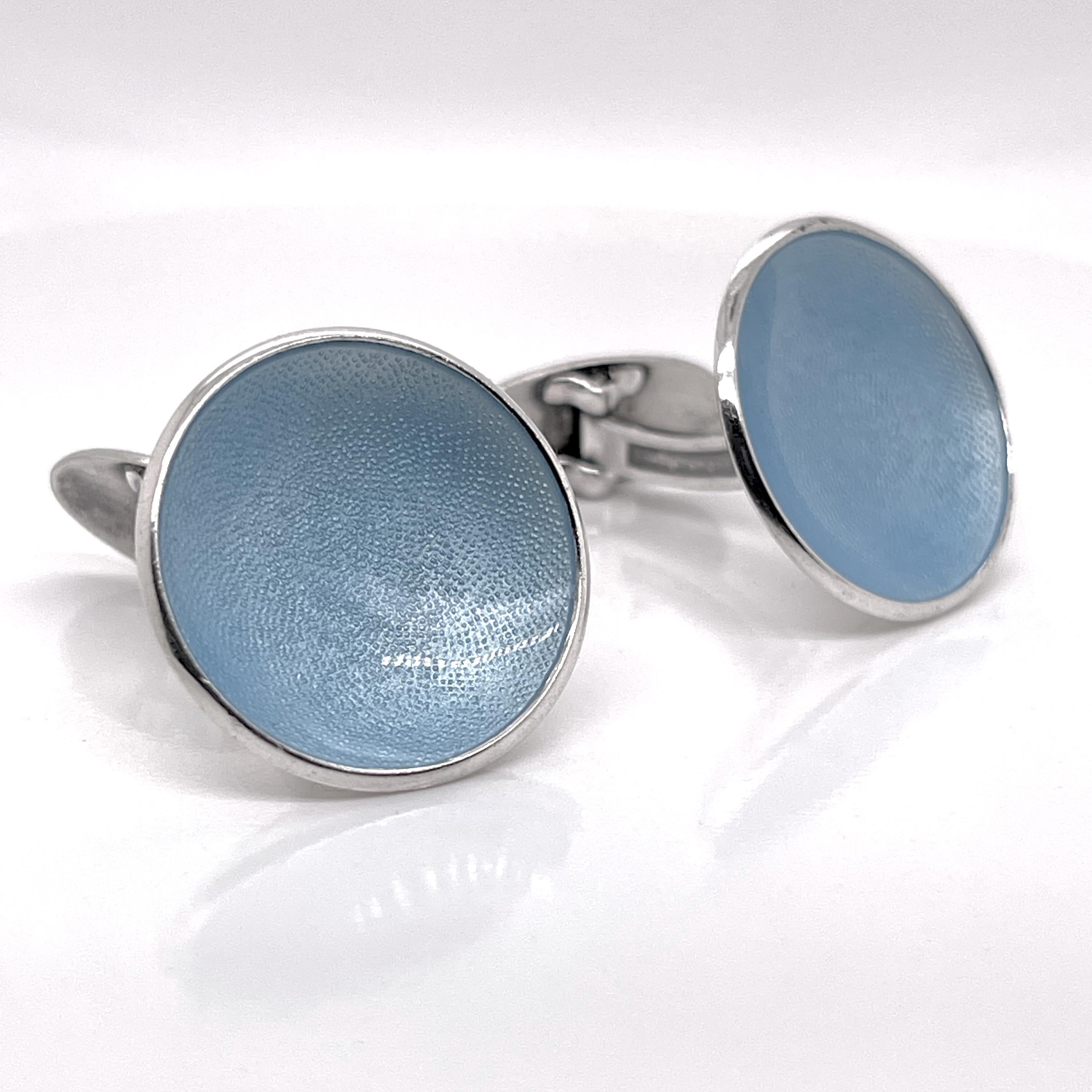 A fine pair of Norwegian cufflinks.

By Einar Modahl of Oslo, Norway.

In sterling silver with blue guilloche enamel.

Simply great Scandinavian Modern cufflinks!

Date:
Mid-20th Century

Overall Condition:
They are in overall good, as-pictured,