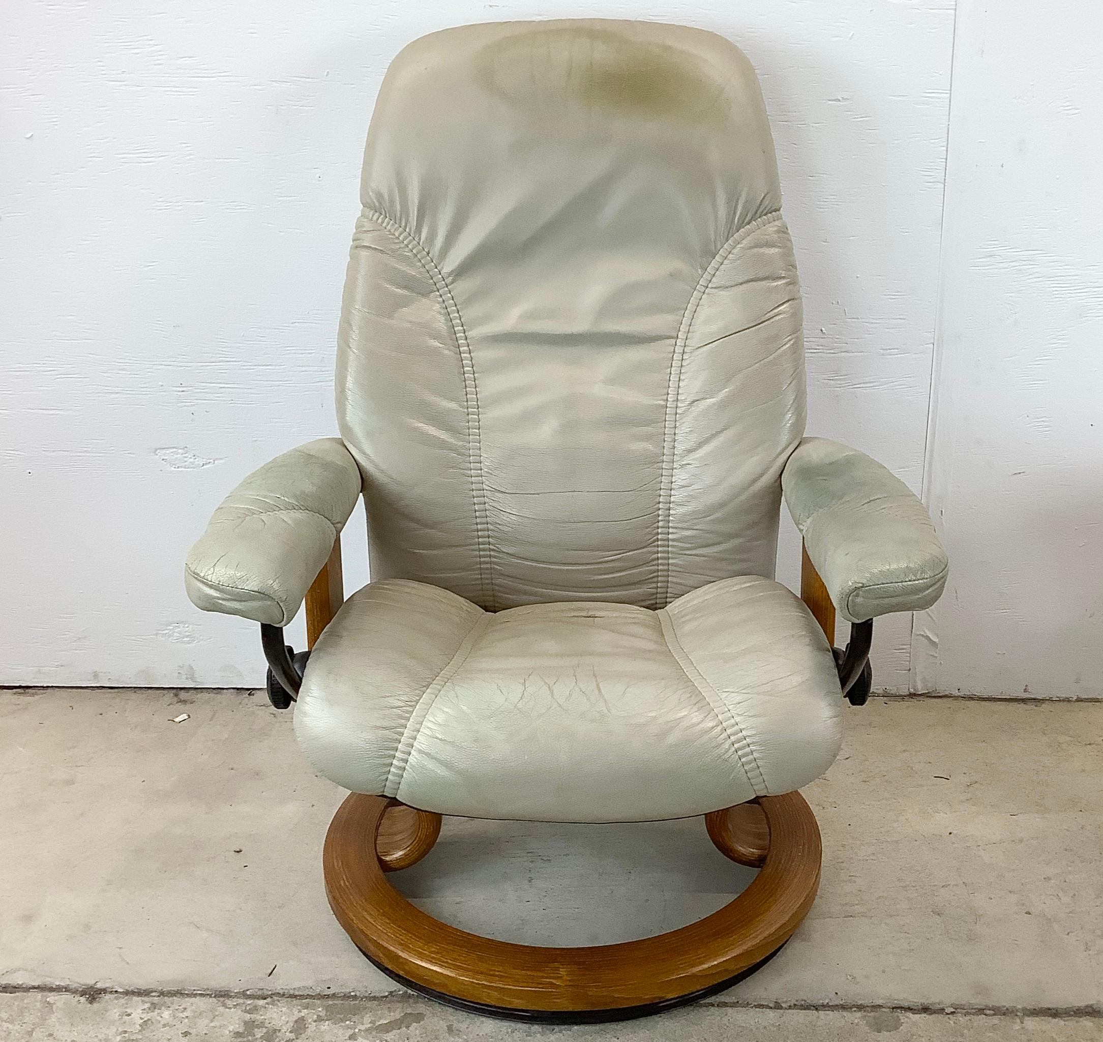 Pair Ekornes Stressless Swivel Chairs with Ottoman 1