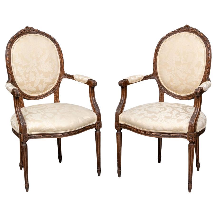 Pair Elegant Carved Upholstered Fauteuils inLouis XVI Style For Sale