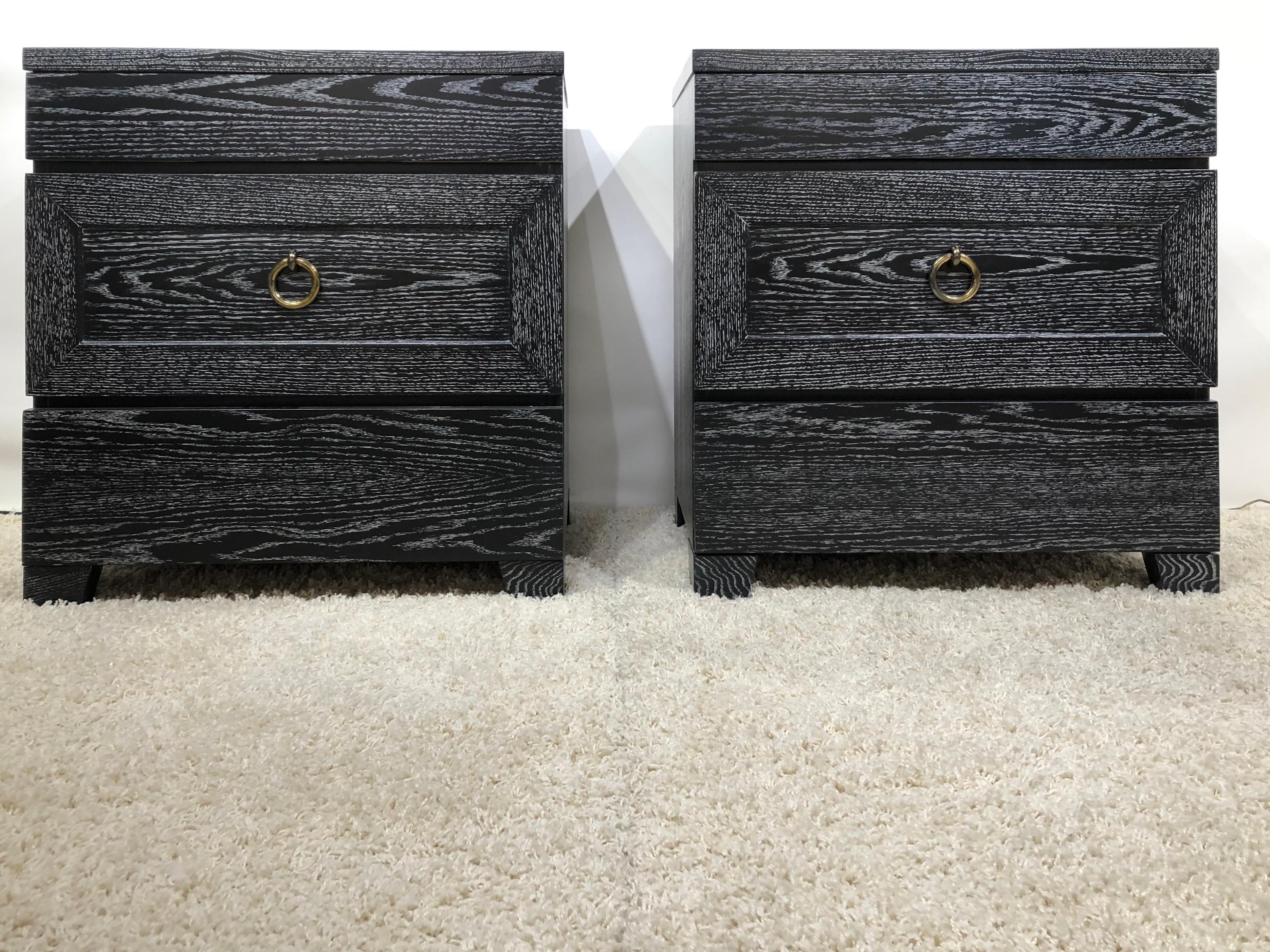 Pair of oak cerused James Mont petite three-drawer chest / nightstand cabinets with original bronze finish ring.
   