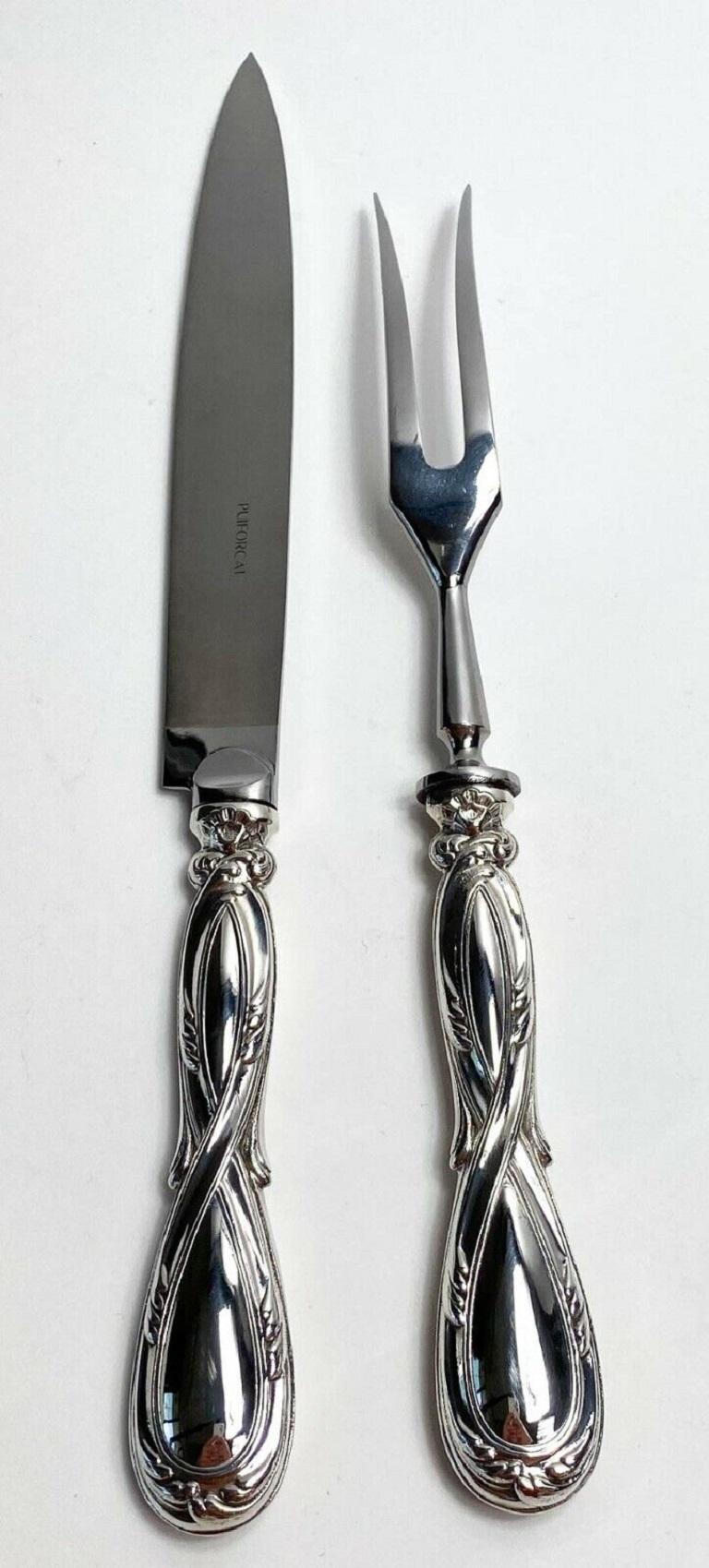 Pair Emile Puiforcat France Sterling Silver Carving Knife & Fork in Royal Pattern. Knife with a stainless steel blade. Fork marked Inox to base, knife marked Puiforcat to the blade.

Additional information:
Composition: Sterling Silver 
Brand: