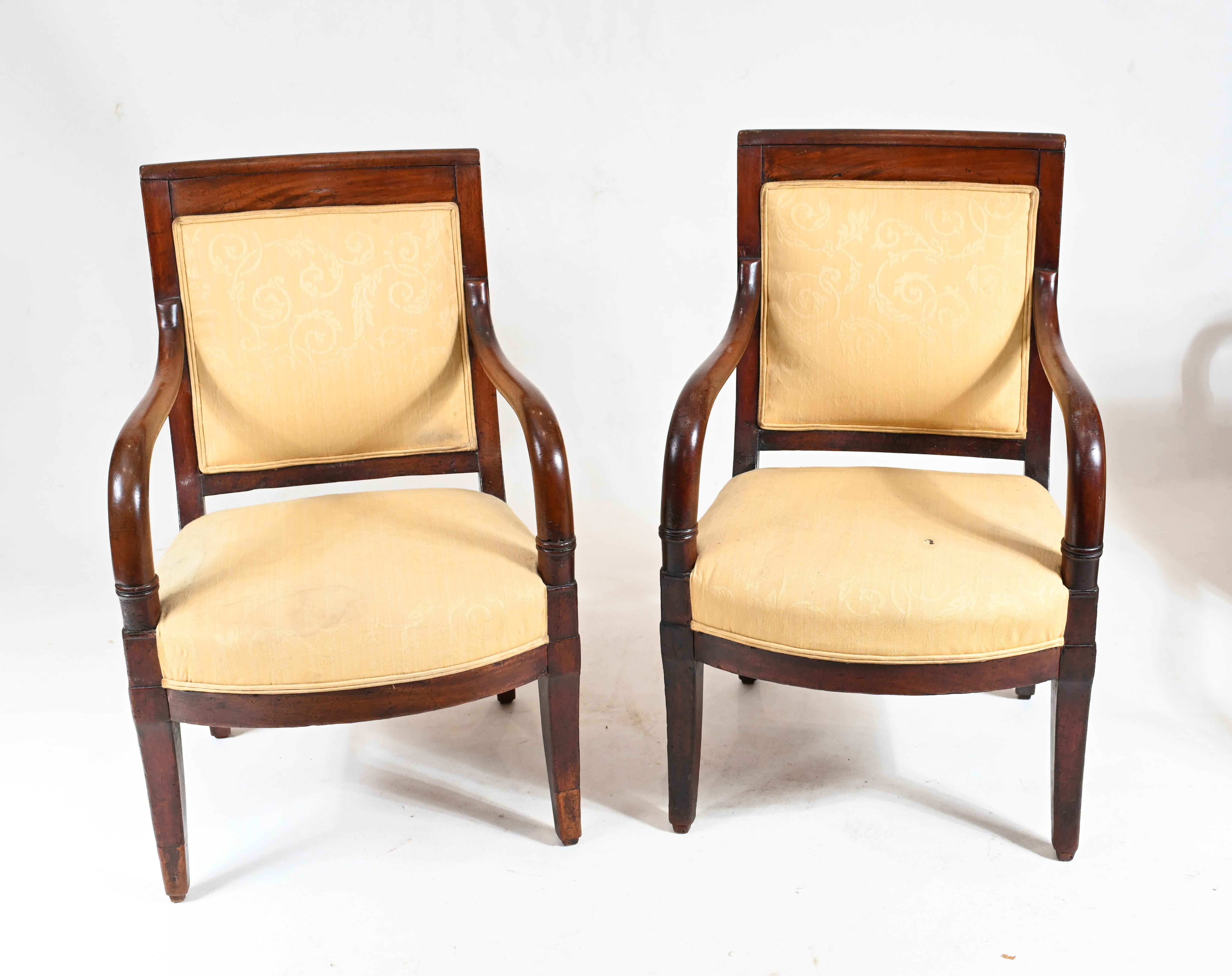 Elegant pair of French antique arm chairs in the Empire manner
This pair date to circa 1880
Bought from a dealer on Marche Biron at Paris antiques markets
We can ship to anywhere in the world 
Offered in great shape ready for home use right away.