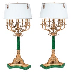 Coppia di lampade da tavolo impero in finta malachite dorate