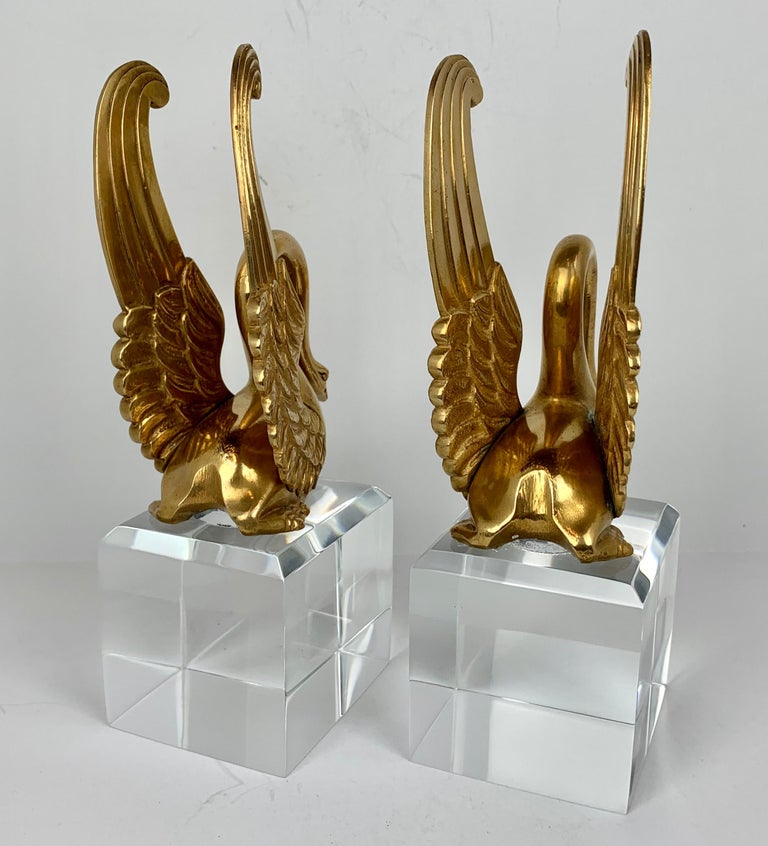 Bronze Doré Empire Swans Custom Mounted on Lucite Plinths In Good Condition In West Palm Beach, FL