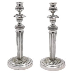 Paire de chandeliers en métal argenté d'époque Empire France circa 1820