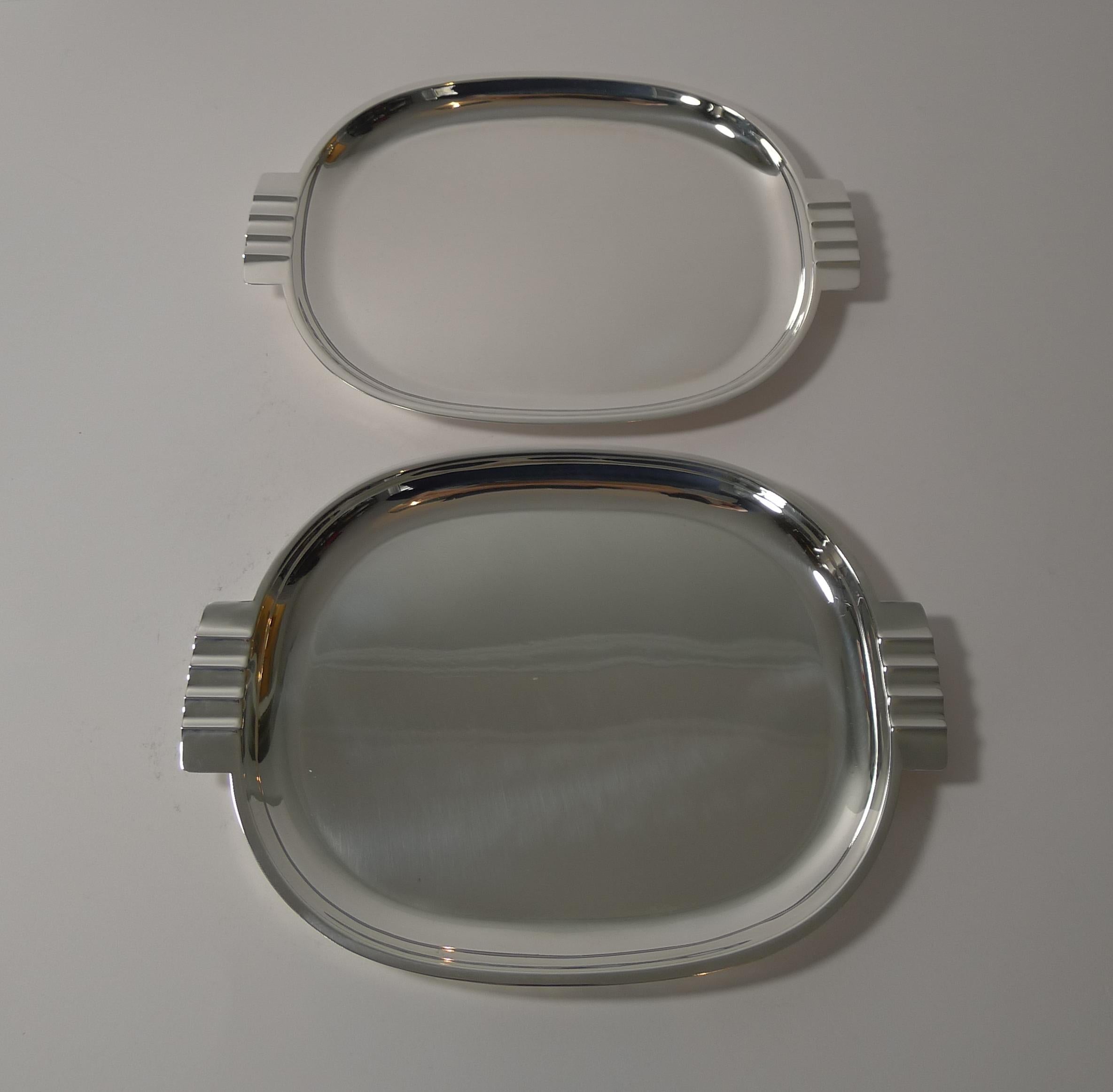 A fabulous pair of vintage silver plated cocktail / hors d'oeuvres dishes in a stunning Art Deco design, about as stylish as they come.

Each is marked on the underside EPNS for Electro-Plated Nickel Silver and they are lucky enough to have an