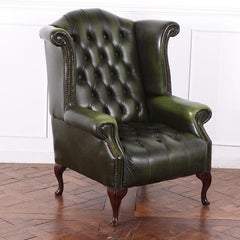 Pair English Button Tufted Leather Wingback Armchairs made in England