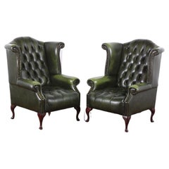 Pair English Button Tufted Leather Wingback Armchairs made in England