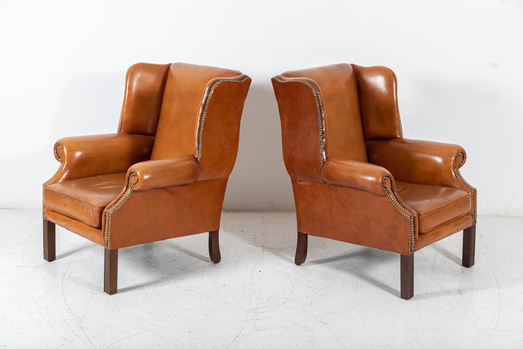 Circa 1950

Pair Georgian style tan leather wingback armchairs

Brass studded with excellent colour and form

Price is for the pair



Measures: W76 x D64 x H97 cm.