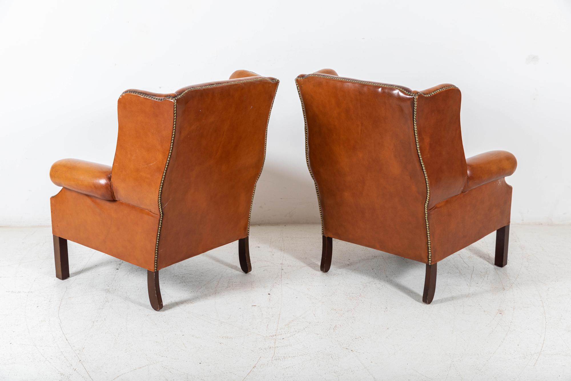 Mid-20th Century Pair English Georgian Style Tan Leather Wingback Armchairs For Sale