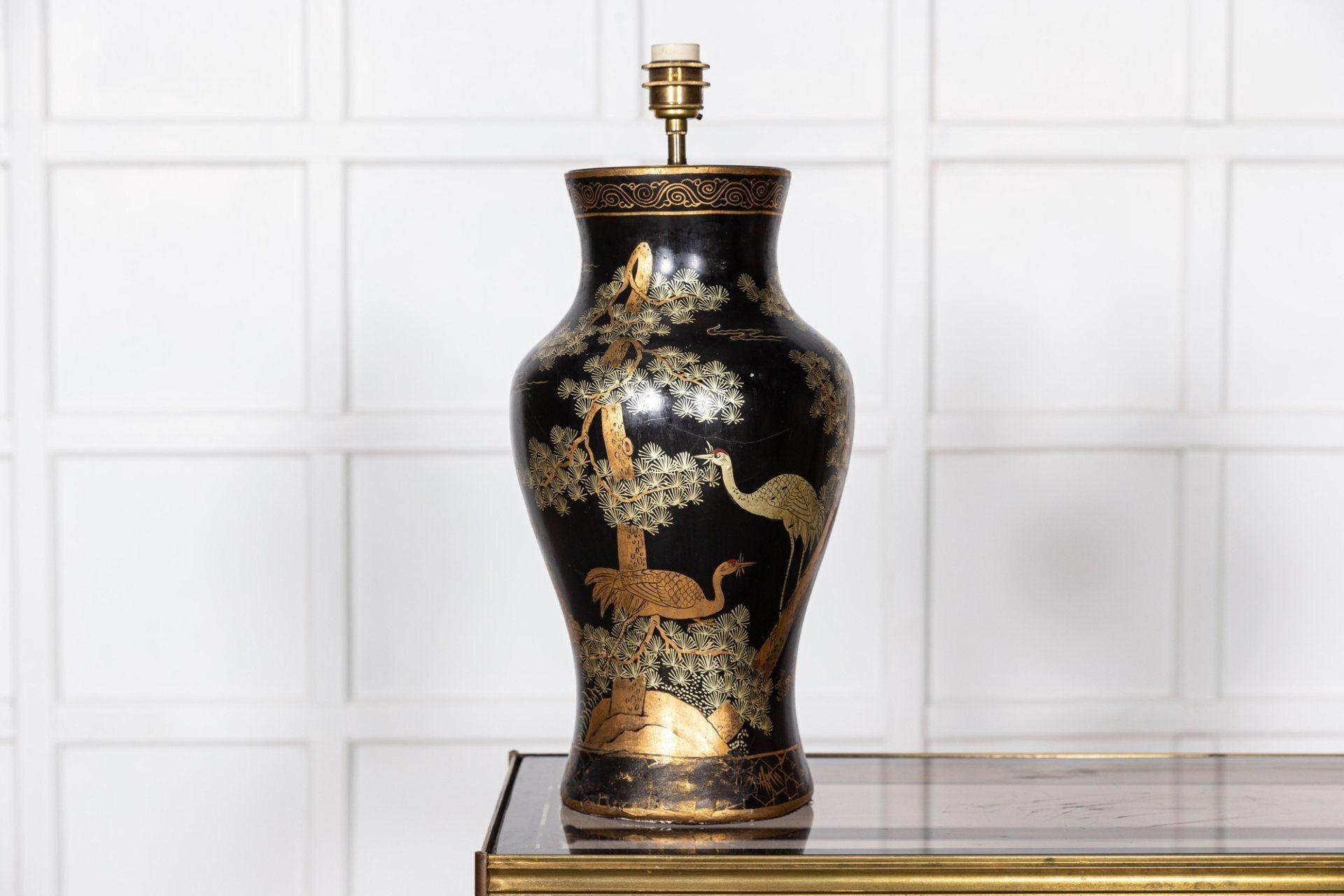 circa 1950
Pair English large Chinoiserie Papier-Mâché table lamps
A striking pair of lacquered black with gilded oriental design, a decorative scene of a fir tree, stork and deer, the top and base of the lamps are finished with a gilded pattern.