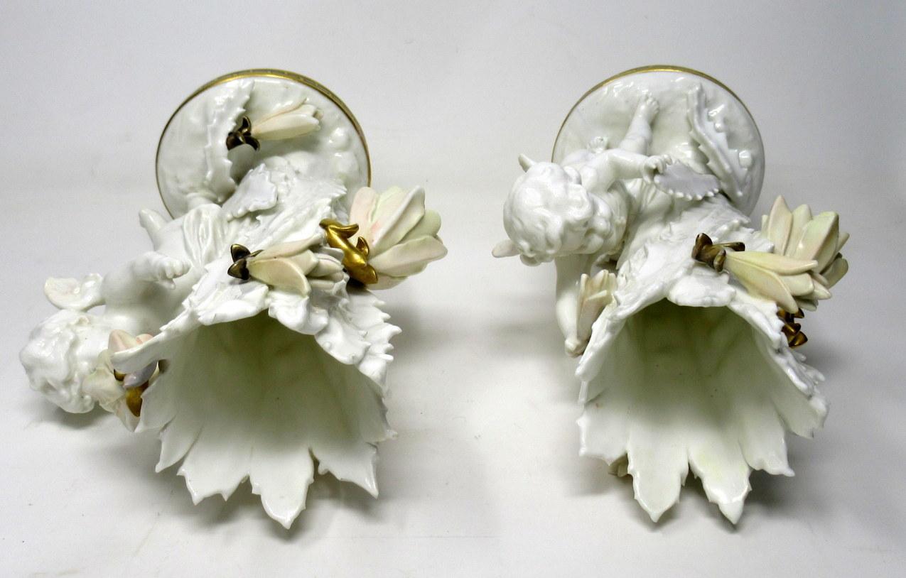 Late 19th Century Pair of English Moore Brothers Porcelain Cream Gilt Cherub Vases Centerpieces