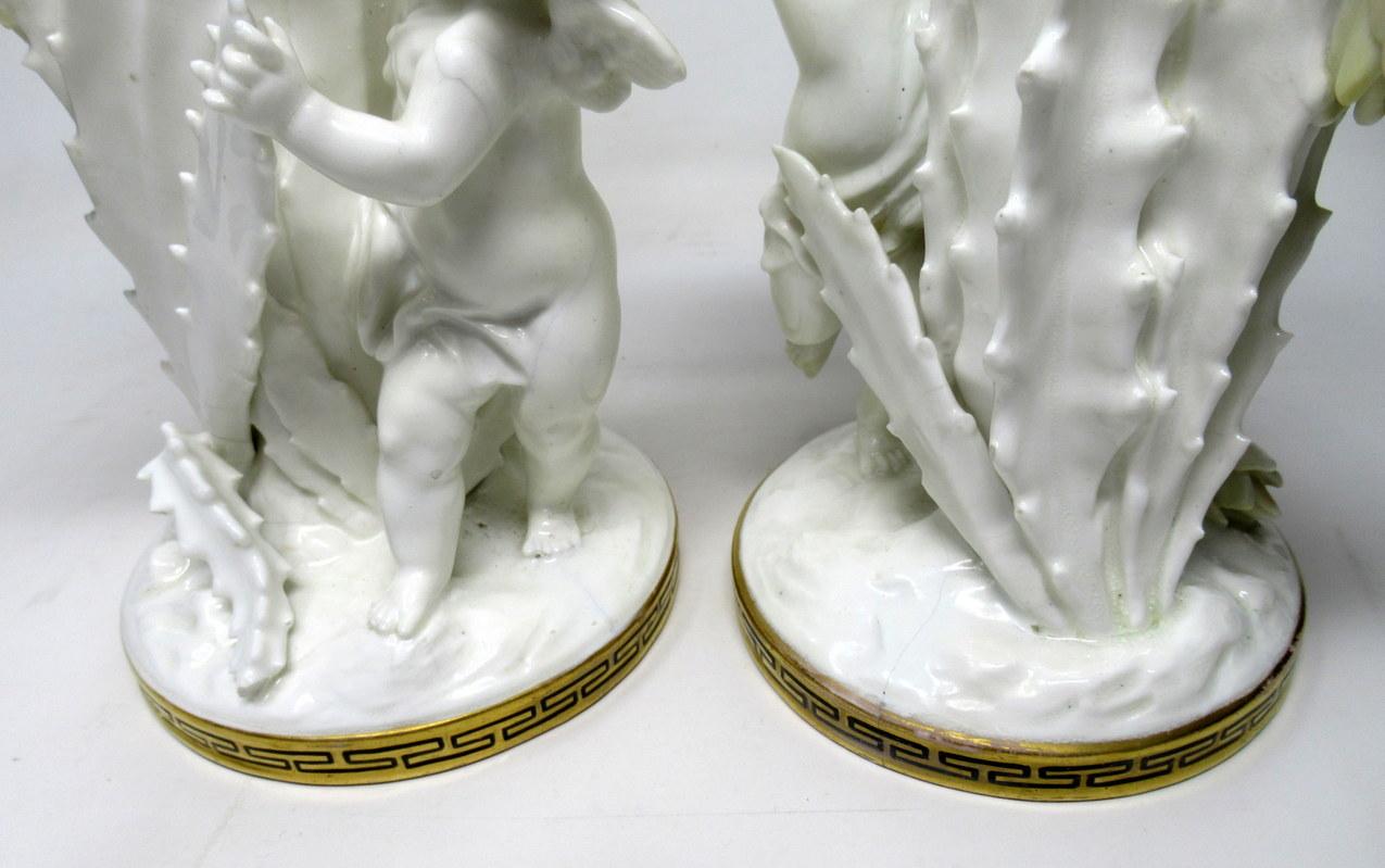 Ceramic Pair of English Moore Brothers Porcelain Cream Gilt Cherub Vases Centerpieces