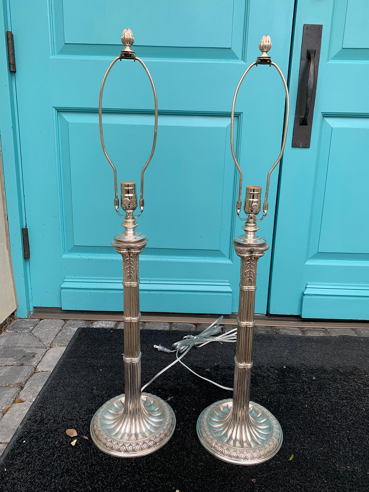 Pair of turn of the century English Prob. Edwardian silver plated column lamps, circa 1900.
Exceptional quality and original surface.