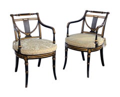 Pair English Regency Ebonized and Parcel-gilt Armchairs with Caned Seat