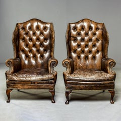 Pair of English Tufted Armchairs in Original Leather with Brass Nail Heads