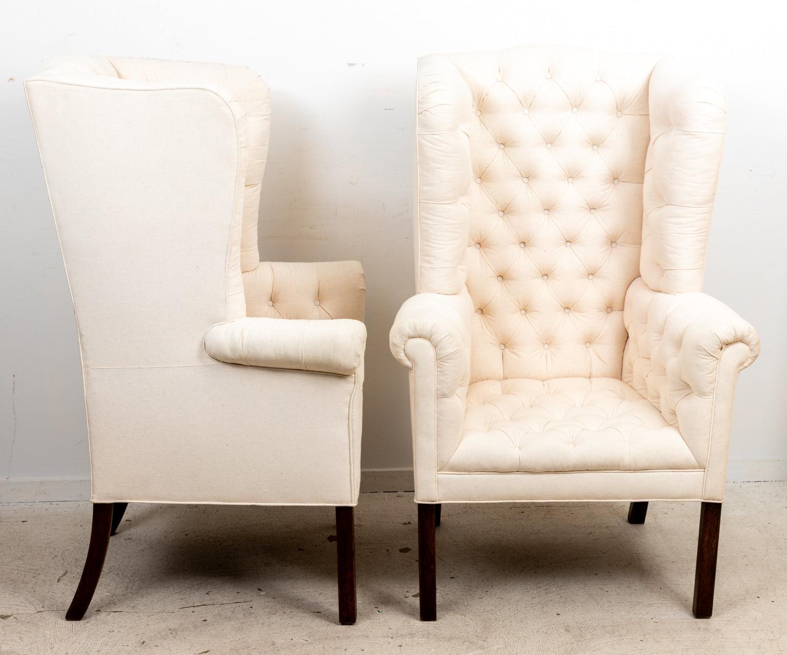 Pair of English tufted Georgian style chairs with horsehair, upholstered in muslin. Legs are mahogany. (Originally done in leather). Please note of wear consistent with age.