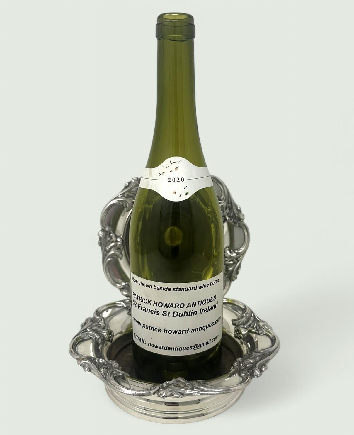 Par de posavasos ingleses victorianos plateados para botellas de vino y champán 1839 Chapado en plata en venta