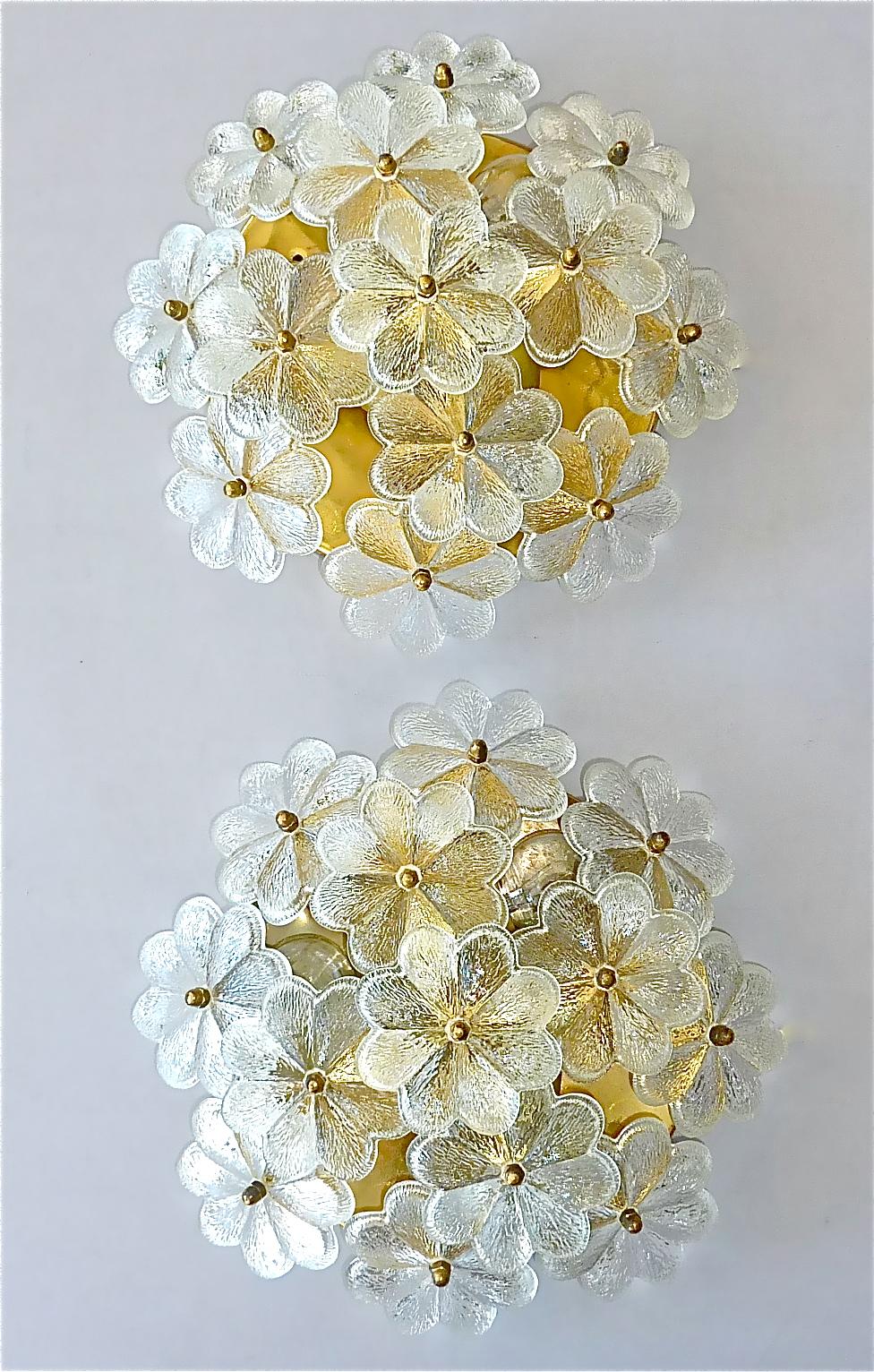 Pair stunning Murano crystal glass flower wall lights or flush mount ceiling lamps by Ernst Palme, Germany 1960s to 1970s. The midcentury lights have a patinated gilt brass base, each three plastic fittings for three E 14 standard screw bulbs to