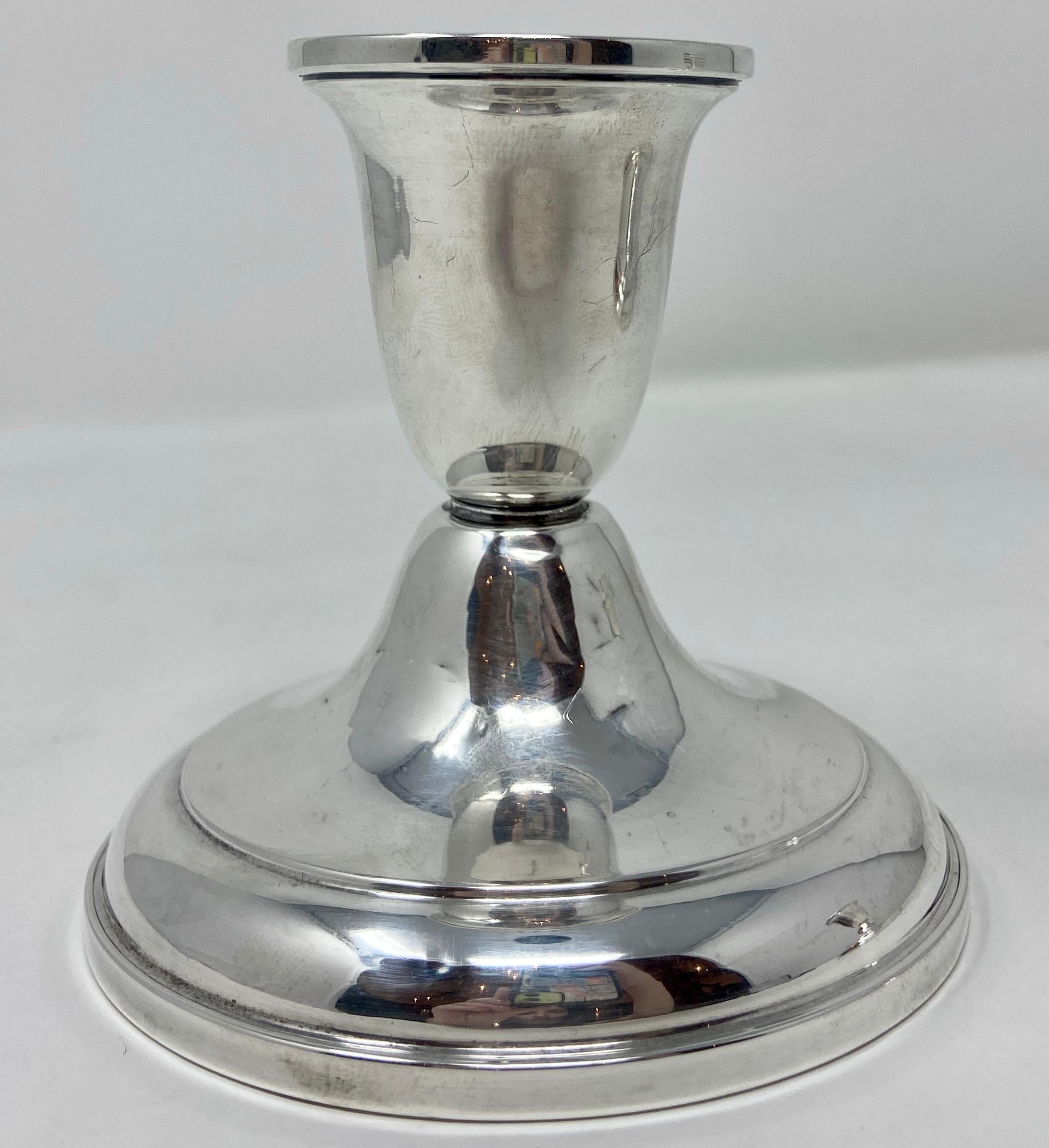 Pair Estate American hallmarked sterling silver small weighted candle sticks.
