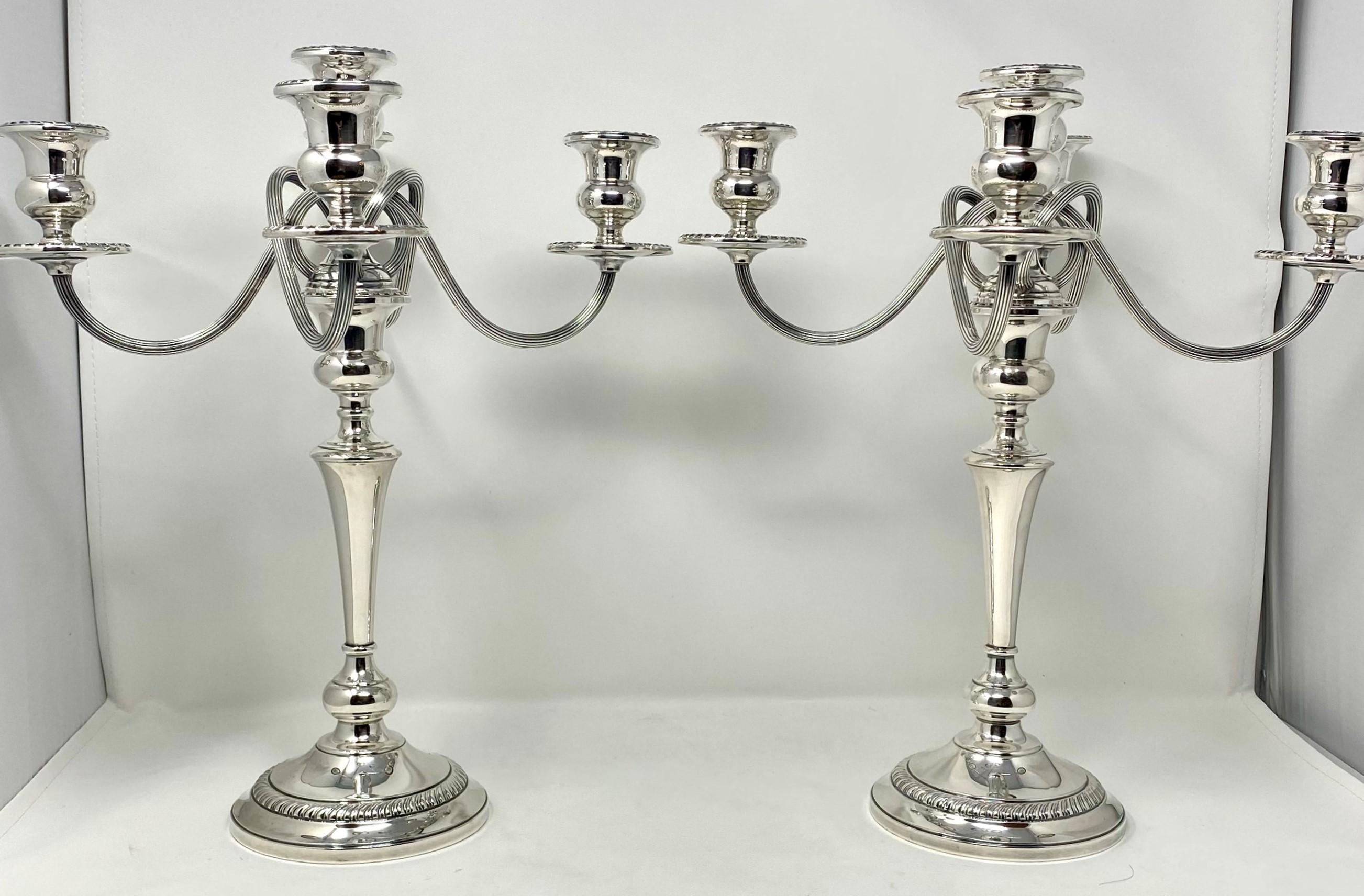 Pair of Estate American Hallmarked Sterling Silver Candelabra, Circa 1940's.
Can be converted from 5-Cup Candelabra to Single-Cup Candlesticks.