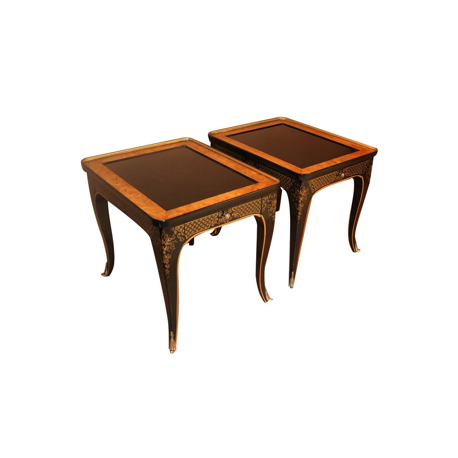Gorgeous black lacquer, elegant Asian, Chinoiserie style side tables, circa 1970s. This exquisite pair is part of the Et Cetera collection by Drexel. Each features a rectangular black lacquer top with burl wood borders, above a single drawer