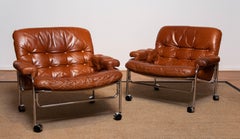Pair 'Eva' Lounge Chairs Chrome and Aged Brown / Tan Leather by Lindlöfs Möbler