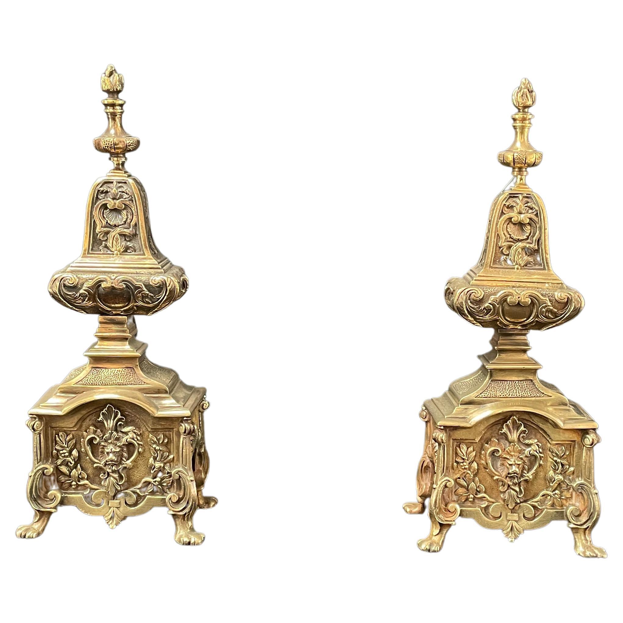 Pair of exceptional French antique andirons. This pair is in perfect condition. 
The details both on the front and the side of the andirons are beautiful. This pair will be a great addition to your fireplace or as an architectural style element.