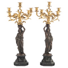 Paire de candélabres exotiques français du 19ème siècle en bronze doré et patiné