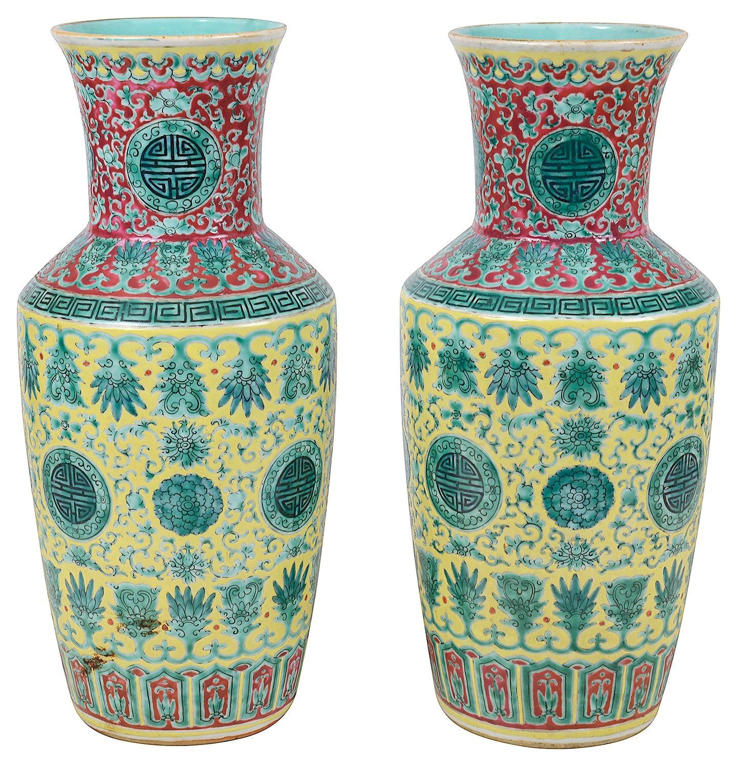 A good quality pair of late 19th Century Chinese Famille Verte porcelain vases / lamps. Each with scrolling foliate and motif decoration to the whole, having this very decorative yellow ground with classical famille verte green.

These vases can be