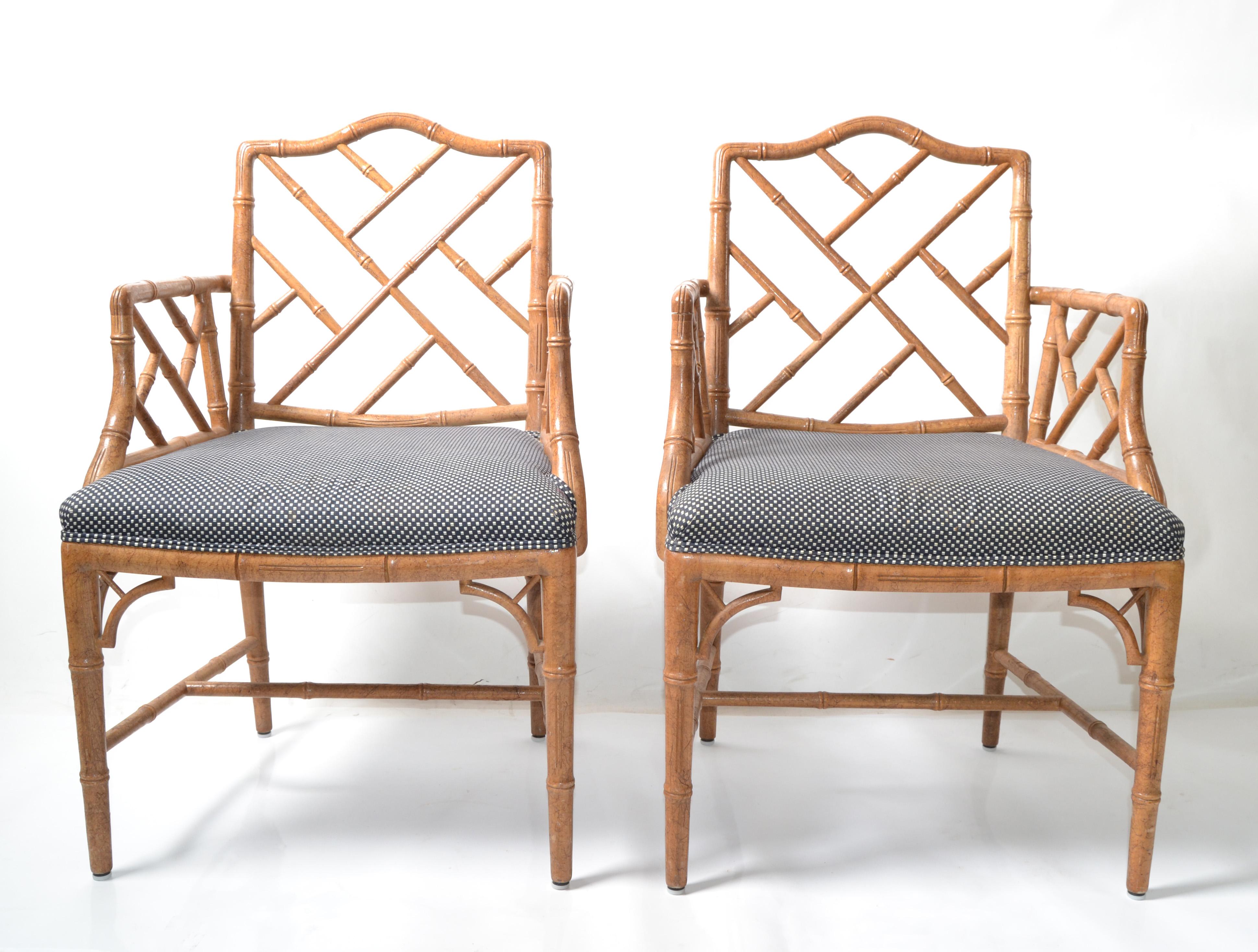 Pair of McGuire Style faux bamboo Chinese Chippendale armchairs in fabric upholstery. 
The chairs are firm, sturdy and very comfortable as the seats are padded.
They are from the early 1970 and in good vintage condition. 

Dimensions