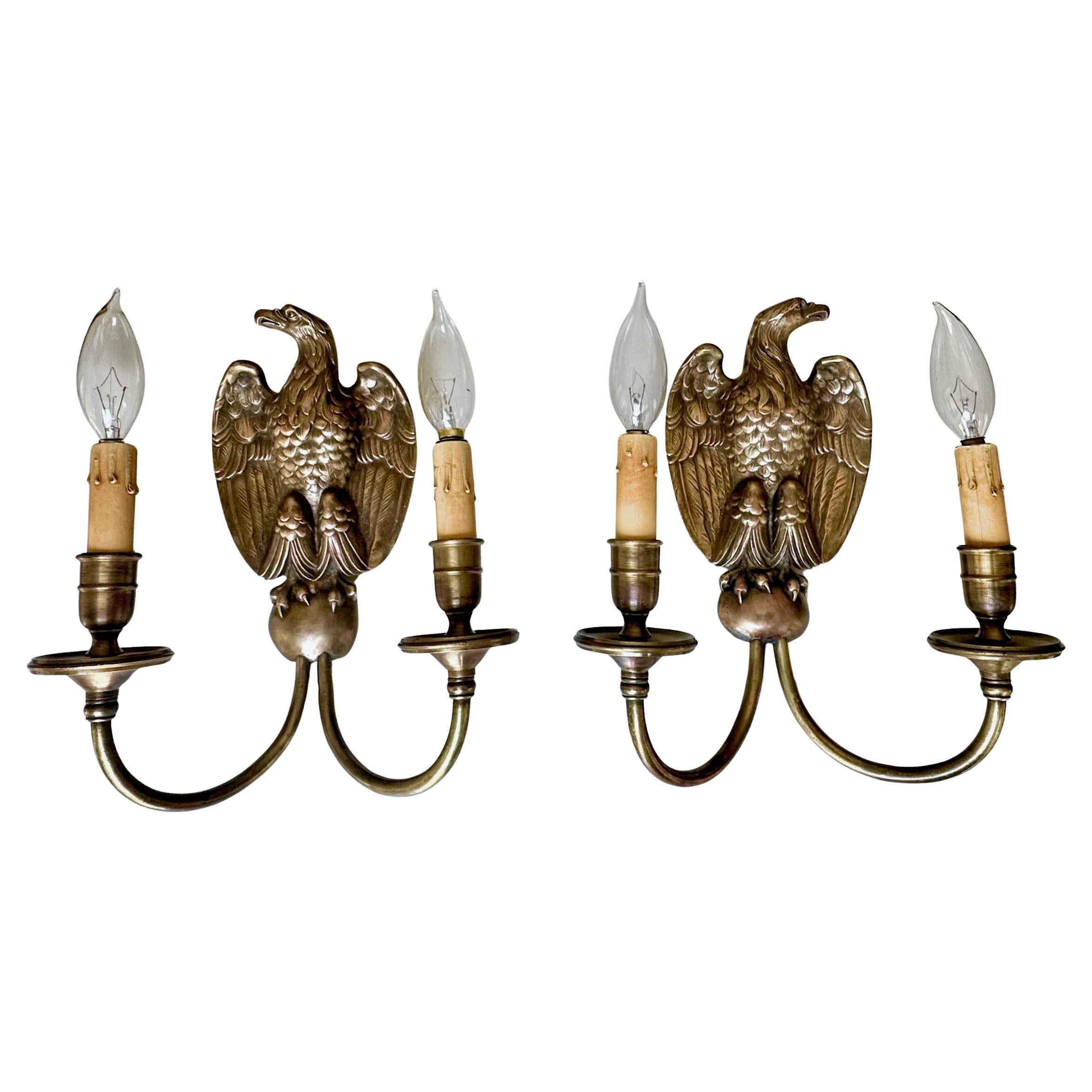 Paire d'appliques à l'aigle de style Feder par Sterling Bronze Co. en vente