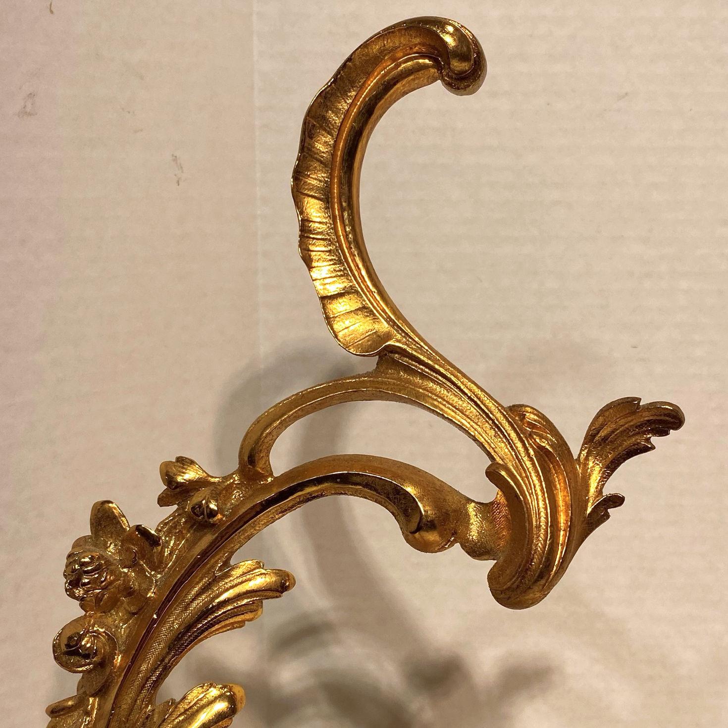 Pair of Figural Louis XV Style Cherub Motif Ormolu Bronze Andirons In Good Condition For Sale In New York, NY