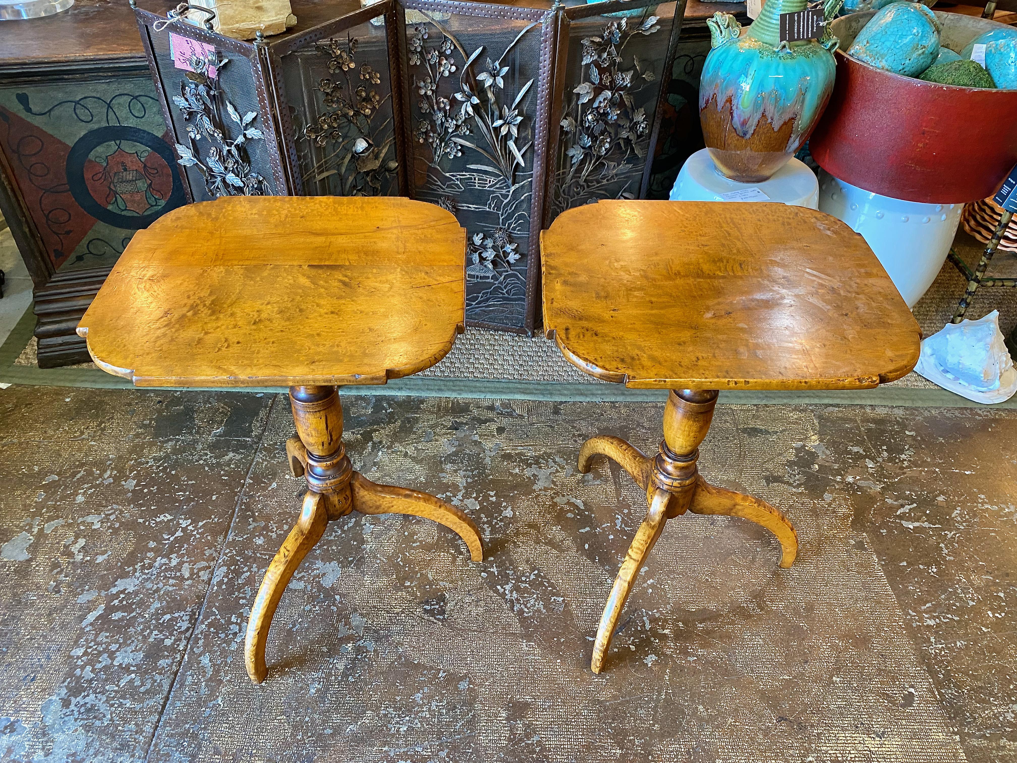 A pair of Federal tilt top tables or candle stands is uncommon; a pair of figured maple spider leg tables in exceptional condition that has remained together for over 200 years is even more desirable. These tables are Massachusetts and date to c.