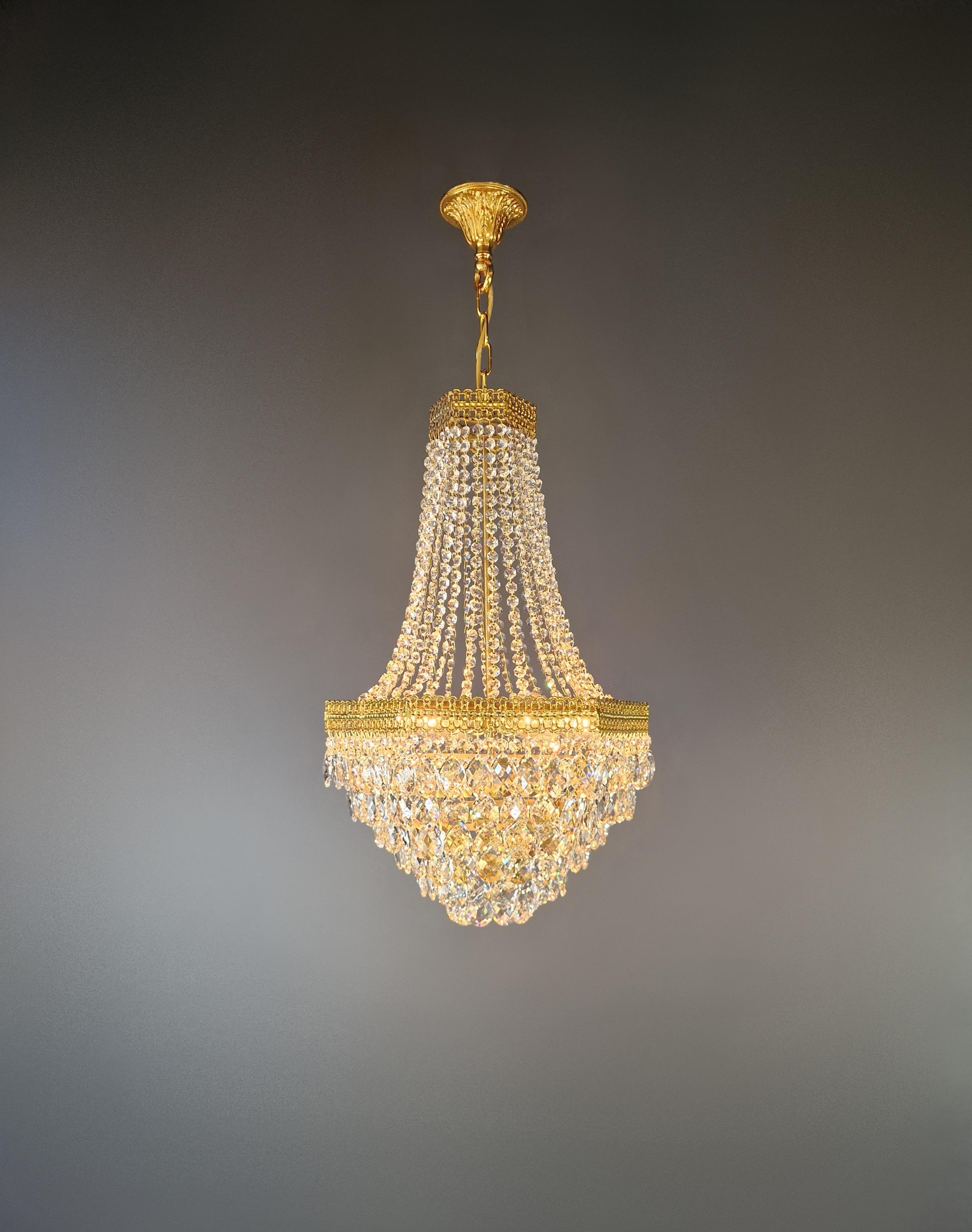 Pair of Antique Empire Sac-à-Perle Chandeliers – Lovingly and Professionally Restored

This stunning pair of antique chandeliers has been carefully and expertly restored in Berlin. The entire electrical wiring has been renewed and is compatible