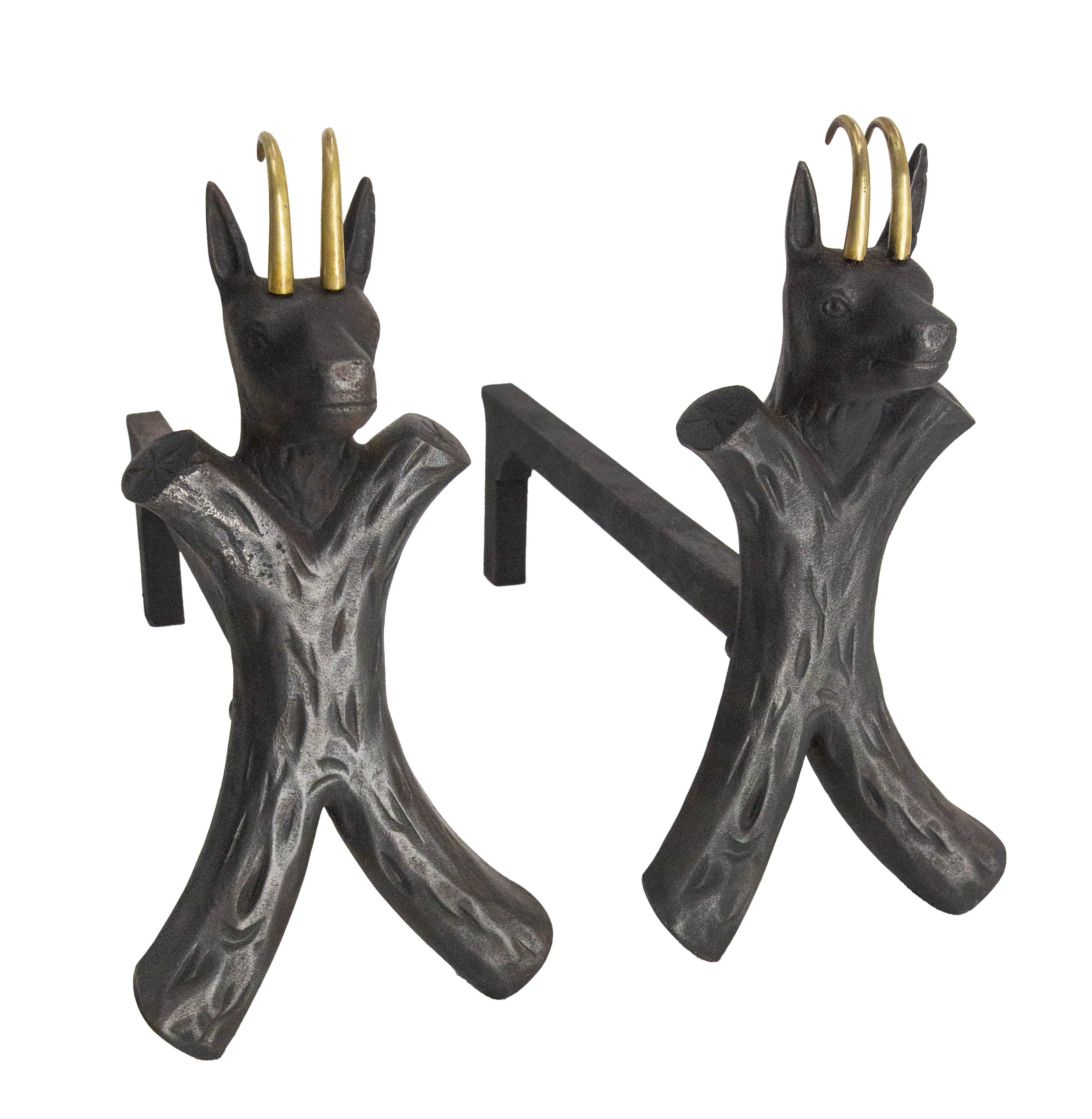 Exceptional pair of andirons of the period Mid-Century Modern
Wrought iron firedogs.
The creator of this pair of andirons gave free rein to his imagination by creating these andirons feature a stylized ibex as the decorative element.The bodies of