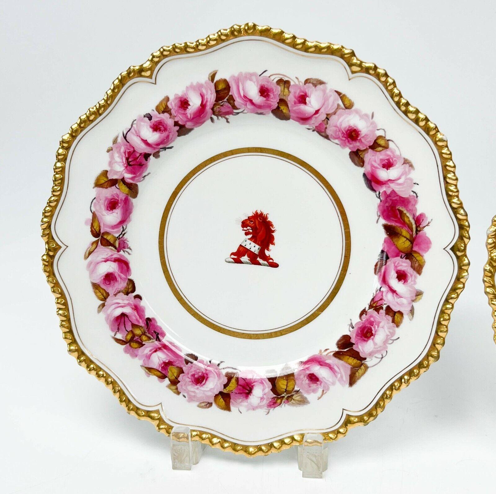 Pair flight, barr & barr Worcester England hand painted porcelain dinner plates, circa 1813-19. Red armorial lion to center with a pink rose pattern to edge. Gilt band to the center and gilt to the scalloped rim. Flight Barr & Barr Worcester marks