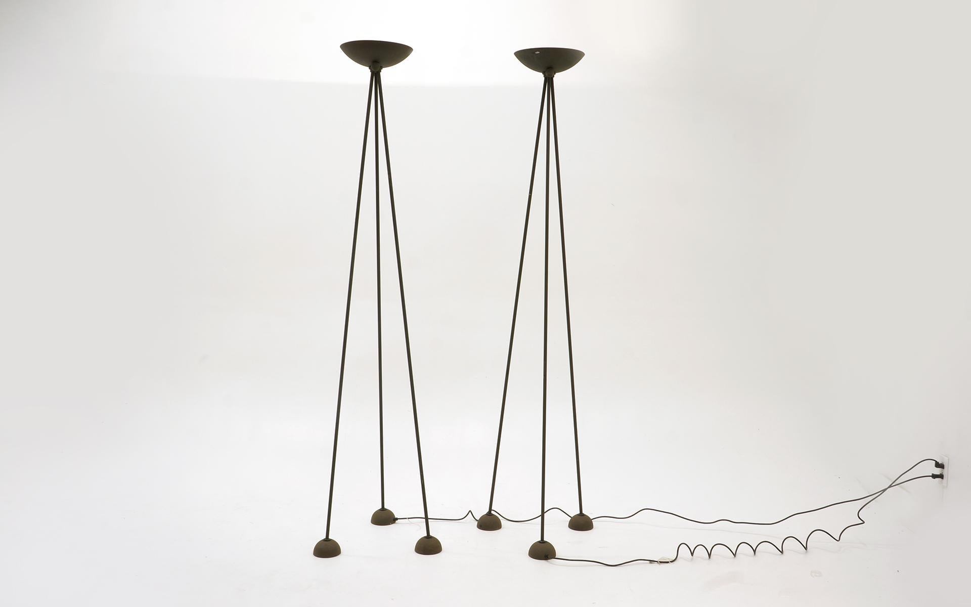 Pair of Postmodern Koch and Lowy floor lamps. Striking tripod design in the original textured black finish.