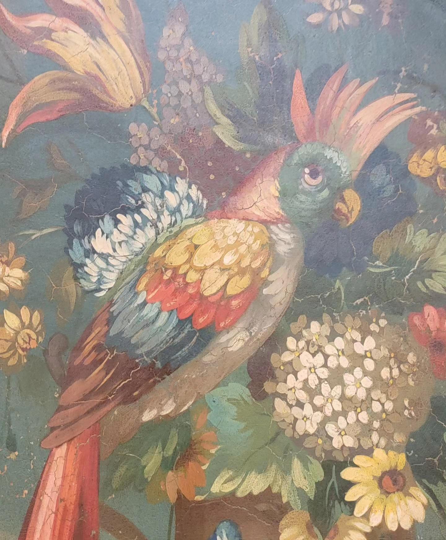 A pair of hand painted panels with urn, parrot and floral motif. Circa. 1920's. California Rancho or Spanish Revival style. Warm, old world glow and patina. Can be mounted to a wall side by side or separately. Originally part of a 3 or 4 panel floor