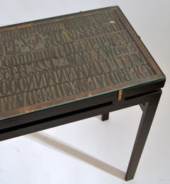 Pair of Consoles with Wood Relief Top on Black Metal Frame
